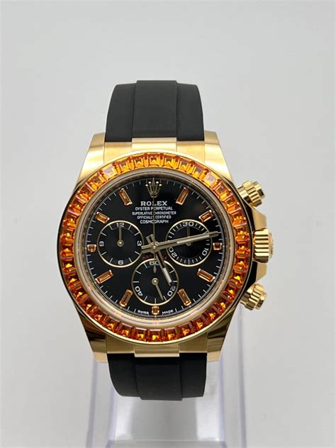 rolex cosmograph daytona recouverte de saphirs orange